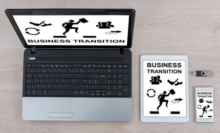 Business transition concept shown on different information technology devicesの写真素材