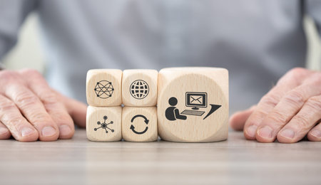 Wooden blocks with symbol of email marketing concept