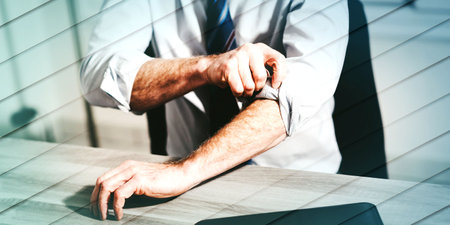 Businessman rolling up his sleeves, concept of motivation, geometric pattern