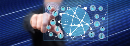 Man touching a global social network concept on a touch screen with his finger