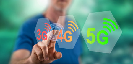 Man touching a 5g concept on a touch screen with his fingerの写真素材