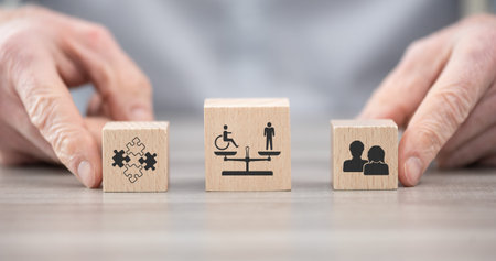 Wooden blocks with symbol of social equality concept