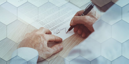 Man signing a legal document, geometric patternの写真素材
