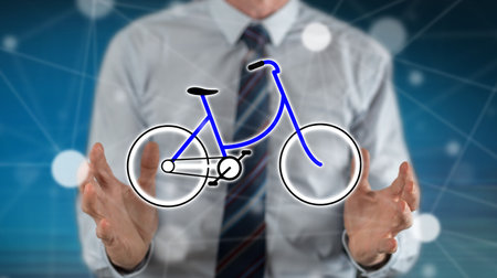 Eco travel concept between hands of a man in backgroundの写真素材