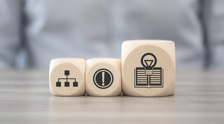 Wooden blocks with symbol of knowledge conceptの写真素材