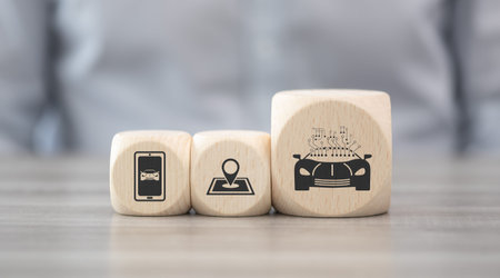 Wooden blocks with symbol of autonomous car concept