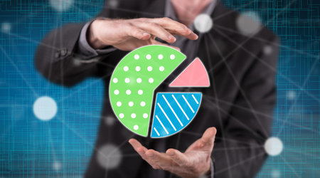 Market share increase concept between hands of a man in backgroundの写真素材