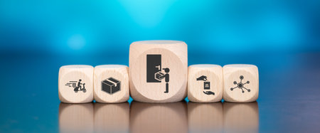 Wooden blocks with symbol of home delivery concept on blue backgroundの写真素材