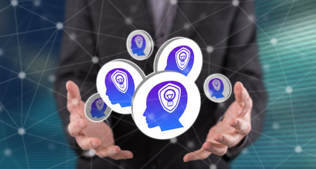 Intellectual property concept above the hands of a man in backgroundの写真素材