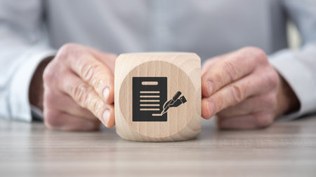 Wooden block with symbol of agreement conceptの写真素材