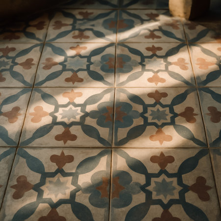 A close-up view of colorful patterned tiles with intricate designs and shadowsの素材