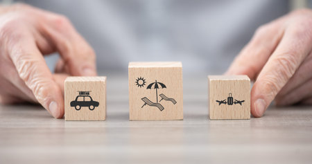 Wooden blocks with symbol of vacation concept