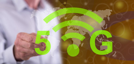 Man touching a 5g concept on a touch screen with a pen