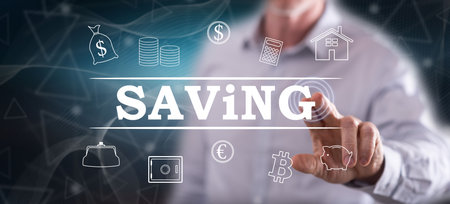 Man touching a saving concept on a touch screen with his fingerの写真素材