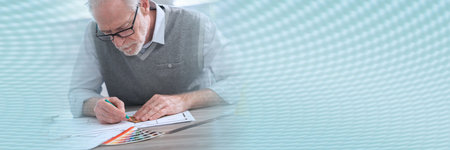 Architect working on a project and using a square; panoramic bannerの写真素材