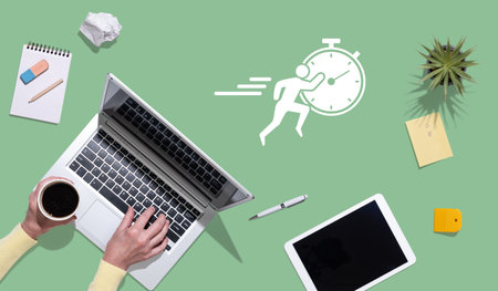 Top view of hands using laptop with symbol of running concept