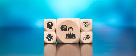 Wooden blocks with symbol of question concept on blue background