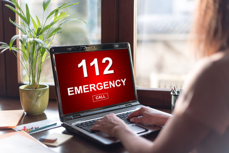 Laptop screen displaying an emergency conceptの写真素材