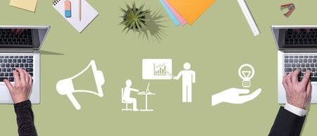 Top view of hands using laptop with symbol of coaching conceptの写真素材