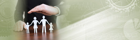 Insurer protecting a family, concept of insured family; panoramic bannerの写真素材