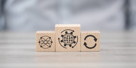 Wooden blocks with symbol of globalization conceptの写真素材