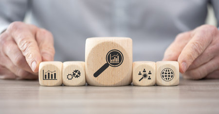 Wooden blocks with symbol of market research conceptの写真素材