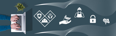 Top view of hands using laptop with symbol of hse conceptの写真素材