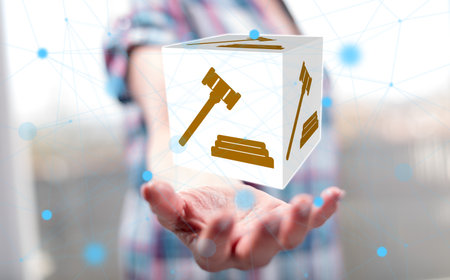 Judgment concept above the hand of a woman in backgroundの写真素材