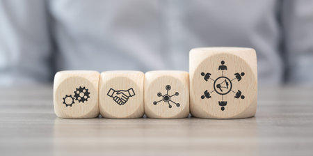 Wooden blocks with symbol of public relations conceptの写真素材