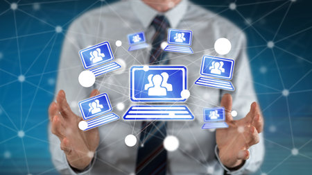 Video conference concept between hands of a man in backgroundの写真素材