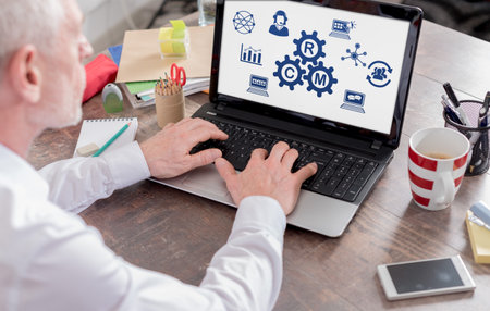 CRM concept shown on a laptop screen