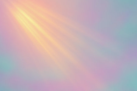 A soft pastel background featuring gentle rays of light creating a dreamy ambianceの素材