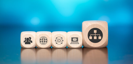 Wooden blocks with symbol of network marketing concept on blue backgroundの写真素材
