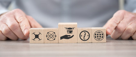 Wooden blocks with symbol of drone delivery concept