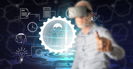 Man with vr headset touching a project planning on a touch screen with his finger