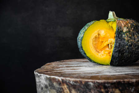 Thai pumpkin on black background, Thai fruit, Cut pumpkinの写真素材