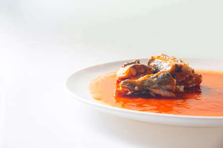 Canned fish in tomato sauce on white background, Sardines, mackerel, Thai fast foodの写真素材