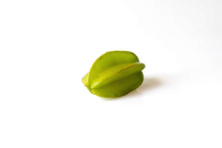 Carambola fruit with slice of star fruit and leaves isolated on a white background, Ripe Star fruit, Starfruit, Averrhoa, Clipping Pathの写真素材