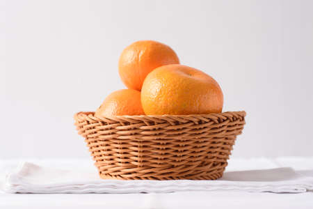 Fresh orange fruit on white backgroundの写真素材