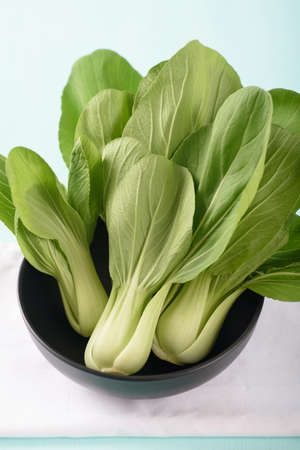 Fresh organic Bok choy or Pak choi on color backgroundの写真素材