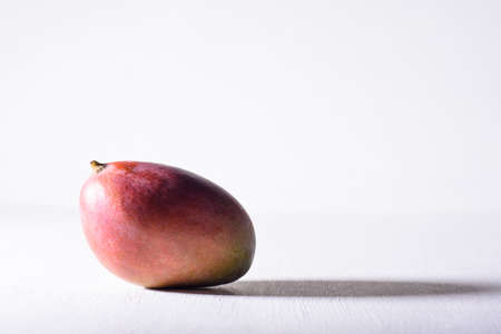 Fresh palmer mango fruit on white background, Tropical fruitの写真素材