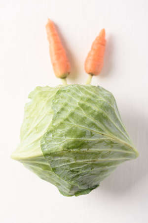 Cabbage and carrot on white background. Organic vegetable from Thai farmer in local marketの写真素材
