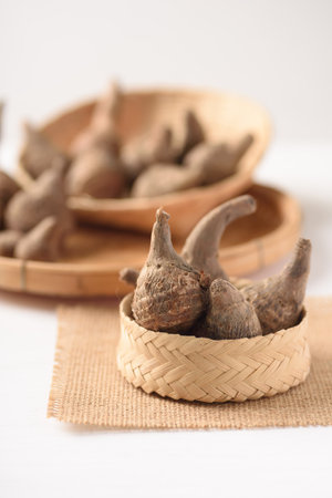 Small taro from local organic agriculture for sustainability on white background