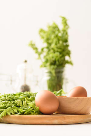 Organic edible fern vegetable from local market on white background