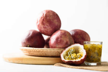 Passion fruit from local market on white background, Tropical fruit in spring and summer seasonの写真素材