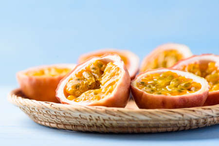 Passion fruit from local market on blue background, Tropical fruit in spring and summer season