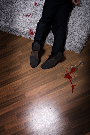 a killing man on the floorの写真素材