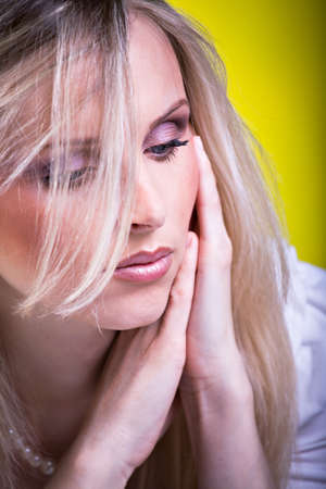 studio portrait of a young womanの写真素材