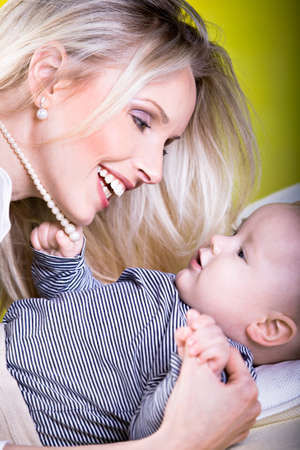 a mother and baby son studio portraitの写真素材