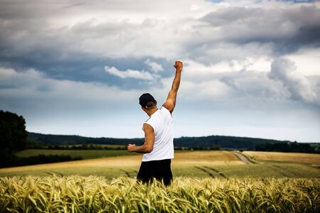 man jogging through the fields